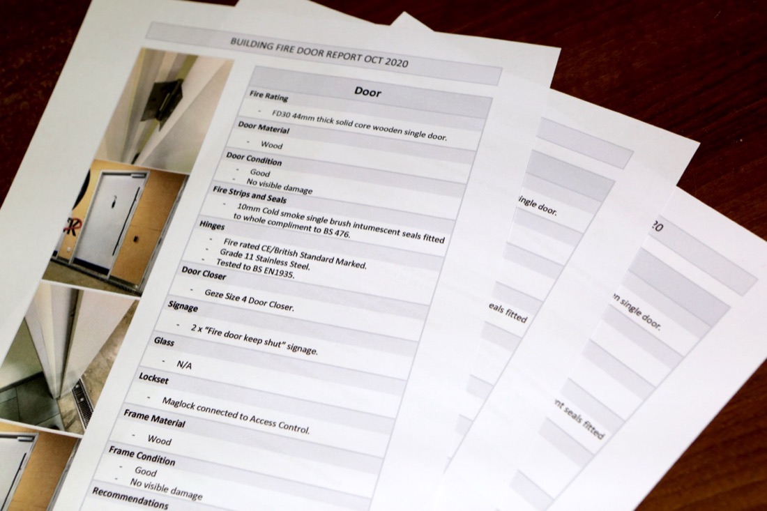 Pages of a Voxtech fire door report